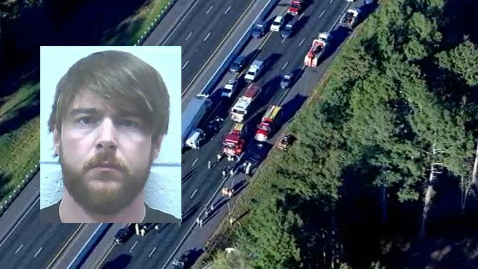 Truck driver charged in deaths of 8 family members on interstate highway