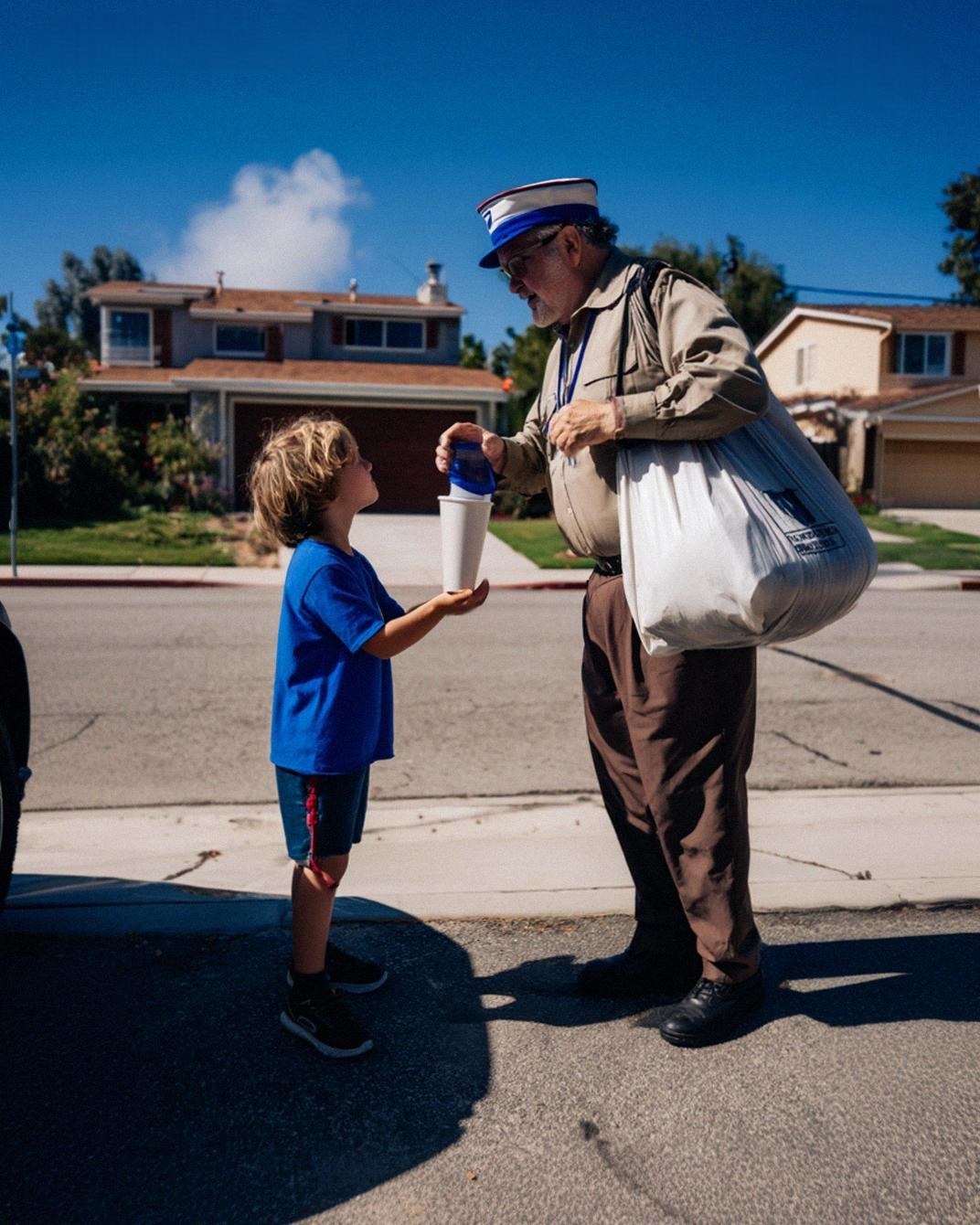 My 5-Year-Old Offered a Mailman a Glass of Water — The Next Day, a Red Bugatti Pulled up at His Preschool